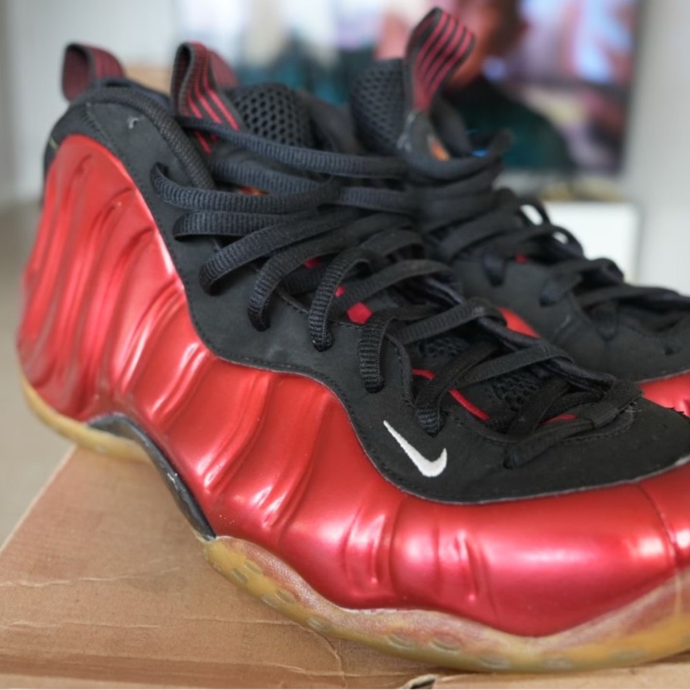 Nike Air Foamposite One Metallic Red sneaker.